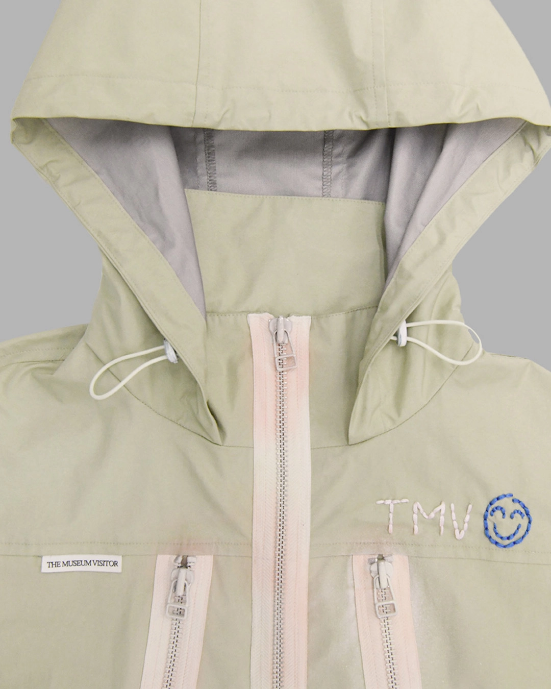 TMV STITCHED SPRAYED WINDBREAKER (IVORY) : THE MUSEUM VISITOR