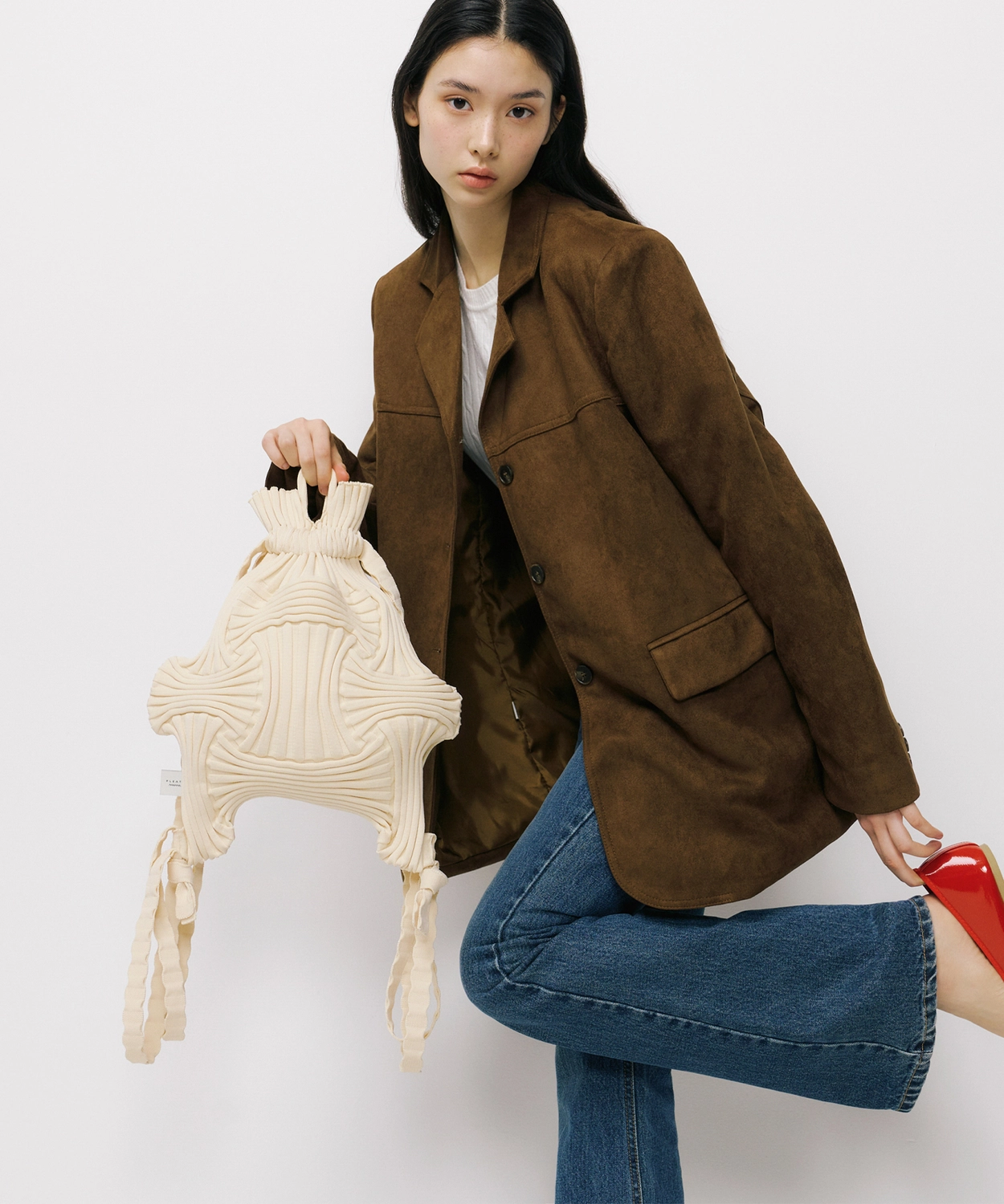 New Bow Backpack Ivory : PLEATSMAMA: Sustainable Knit Pleats Bag